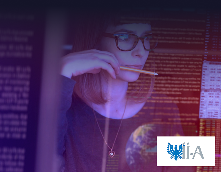 Woman with glasses holding a stylus and looking thoughtfully at data, with code and analytics projected around her in purple and red tones, with the ii-A logo in the corner